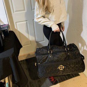 IMAN Rolling Black Duffle Bag Extendable Handle